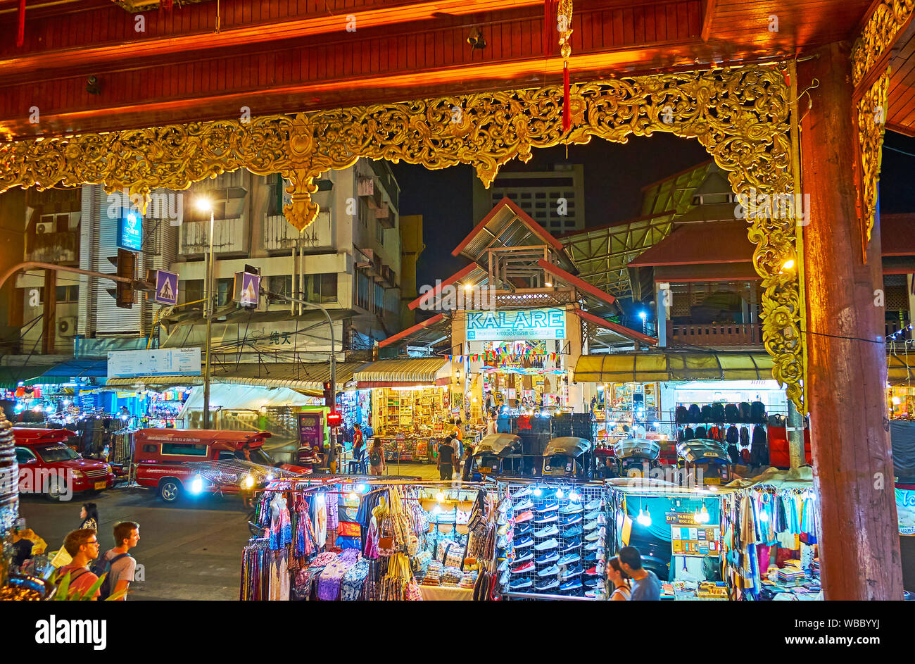 CHIANG MAI, THAILAND - MAY 2, 2019: The view on pavilion of Kalare Night Market from the carved porch of Night Bazaar shopping center, on May 2 in Chi Stock Photo