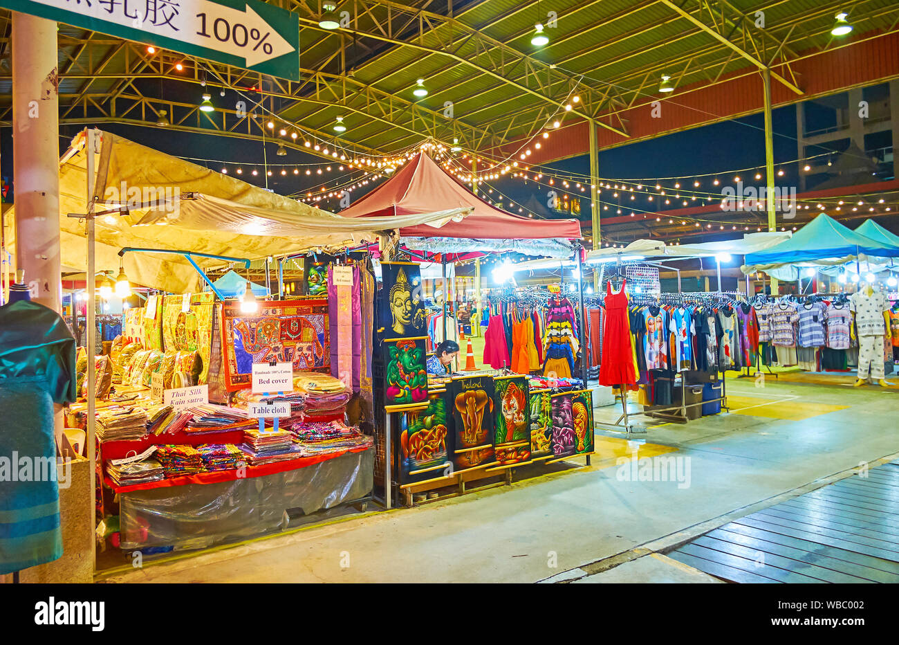 CHIANG MAI, THAILAND - MAY 2, 2019: The garment stalls and tents of Kalare Night Market, located in large pavilion, on May 2 in Chiang Mai Stock Photo