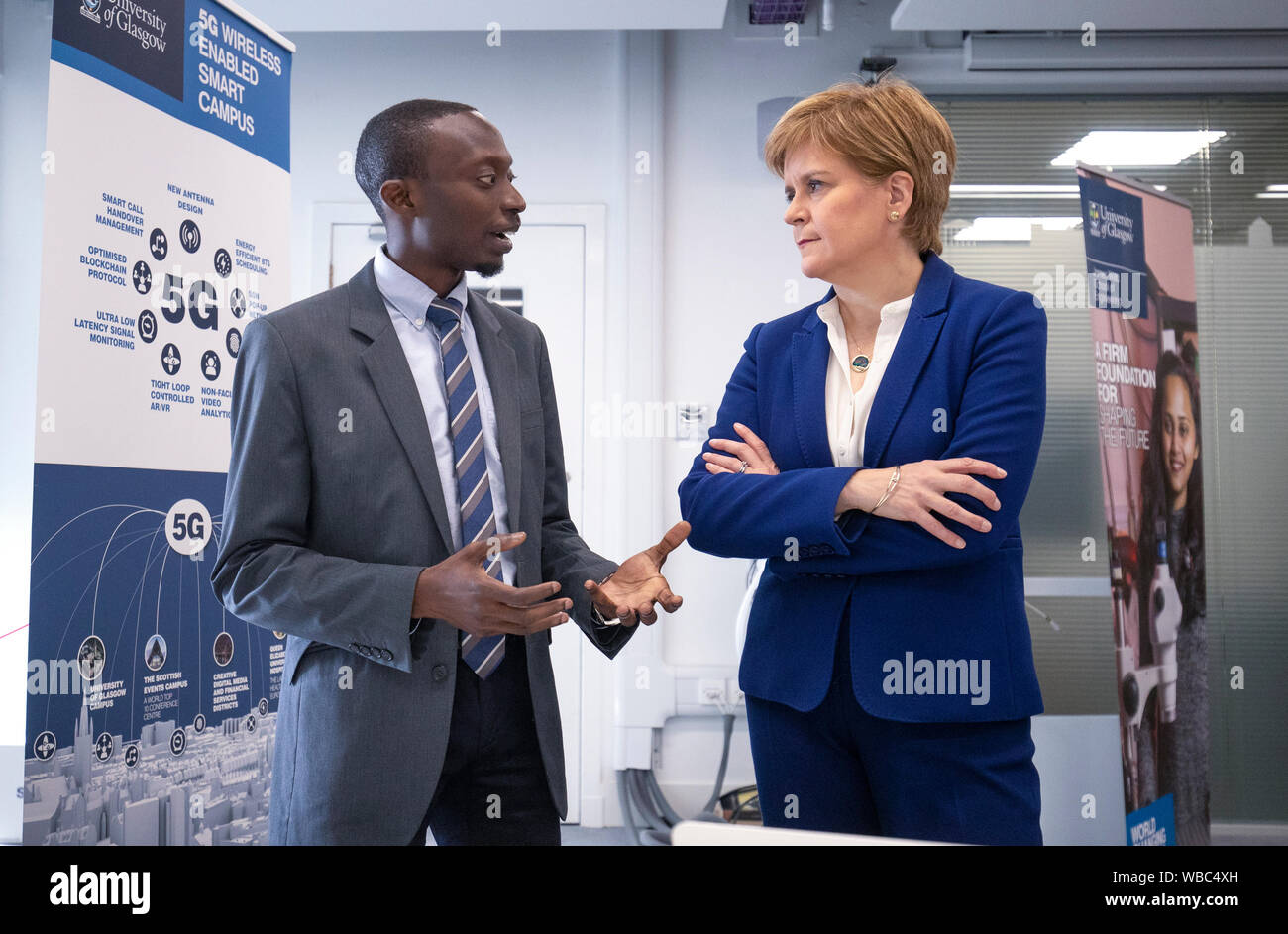 First Minister of Scotland Nicola Sturgeon meets Dr Yusuf Sambo during a visit to the School of Engineering at the University of Glasgow, where the Scottish Government unveiled a new 5G plan. Stock Photo