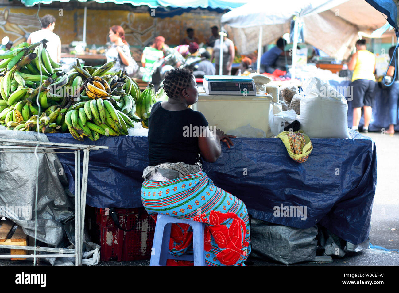 Cayenne, French Guiana 9.10.2010 sellers at weekend farmers market. woman sitting Stock