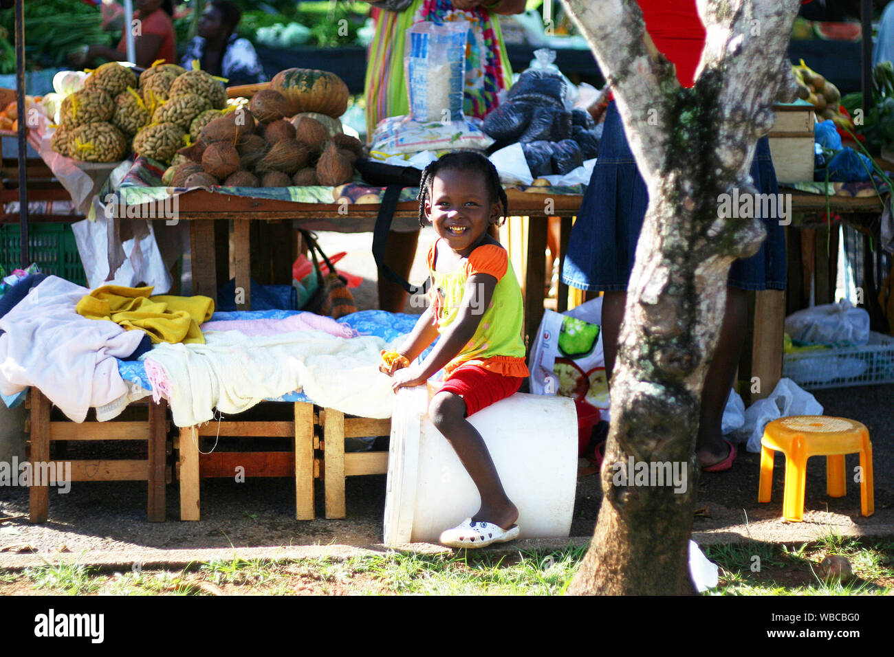 Cayenne, French Guiana - 11.28.2010 - children playing in weekend farmers market Stock Photo