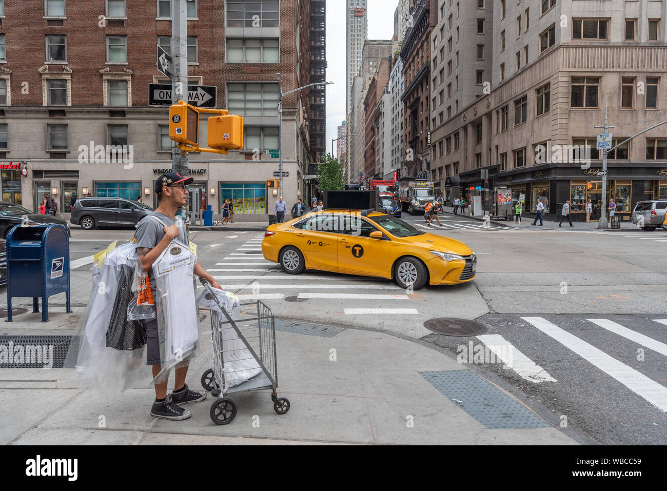 W 58th Street 6th Ave, Manhattan, New York, USA Stock Photo