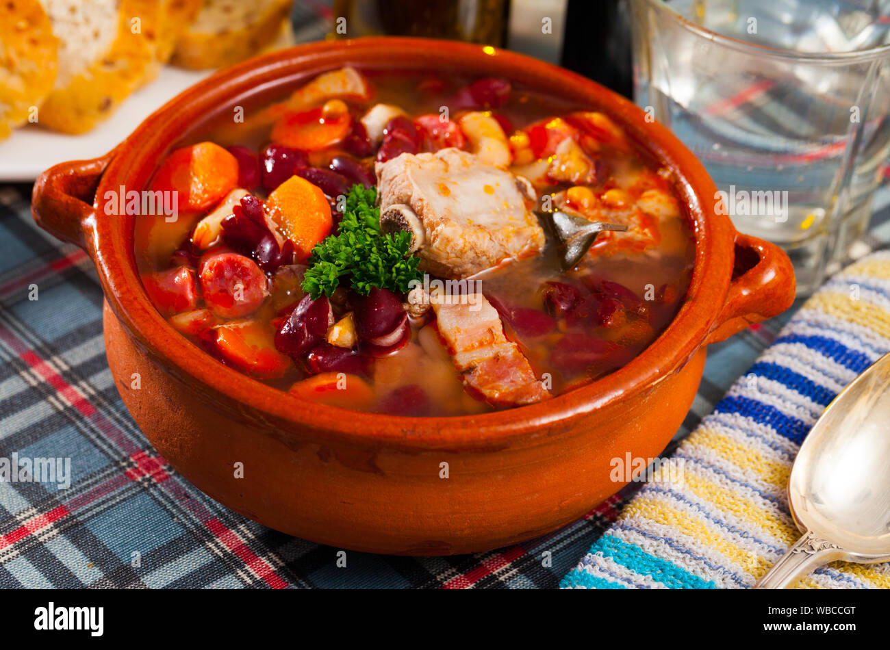 Rich soup with pork and beans Stock Photo Alamy