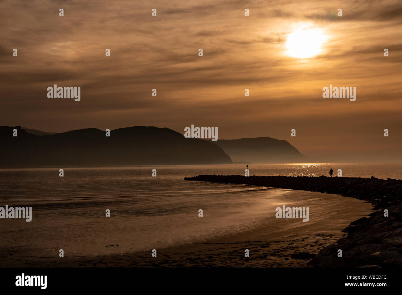 Sunset over the North Wales coast at Llandudno West Shore Stock Photo