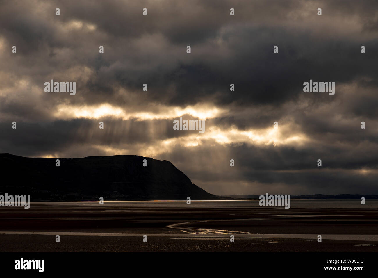 Sunset over the North Wales coast at Llandudno West Shore Stock Photo