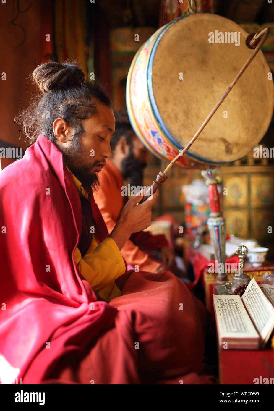Buddhist monk attends the famous 3-days annual Mahakala Puja in Lamayuru monastery (Ladakh) in Lamayuru, India Stock Photo