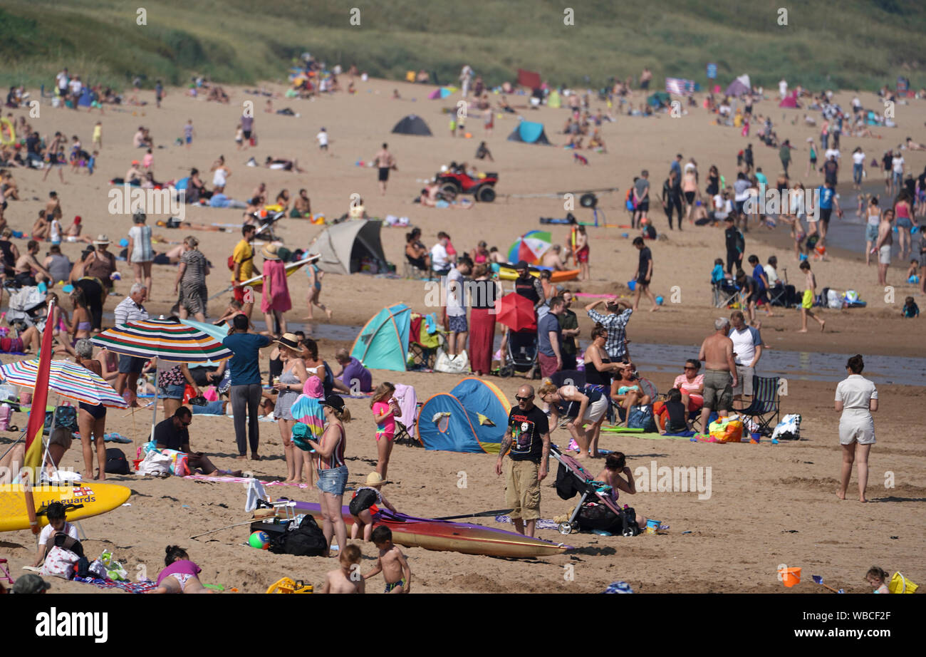 People On Long Sands Beach Tynemouth As They Enjoy The Sunshine