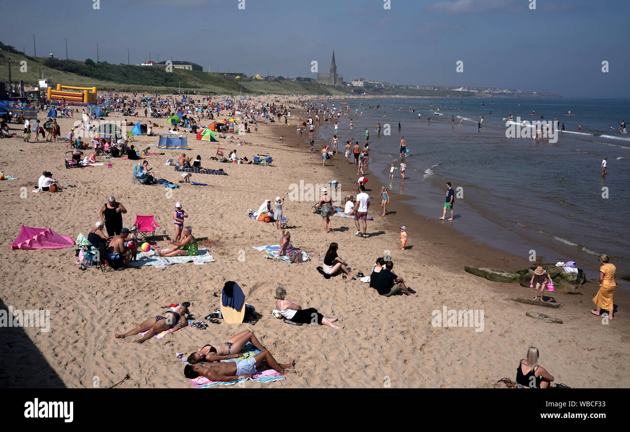People On Long Sands Beach Tynemouth As They Enjoy The Sunshine