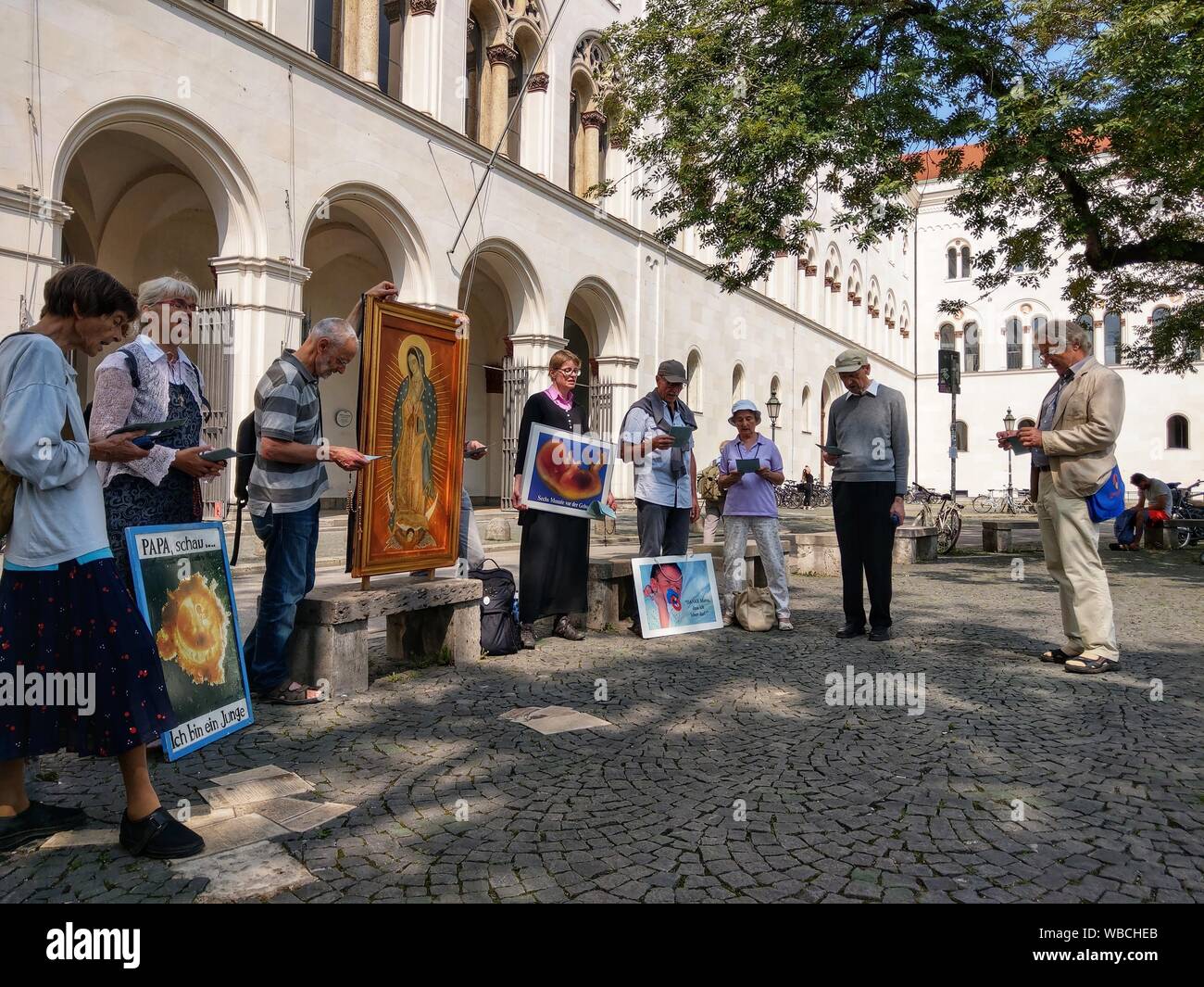Munich, Bavaria, Germany. 26th Aug, 2019. Headed by well-known anti abortion activist Wolfgang Herring, a small group of Christian anti-abortion activists marched through the city of Munich, protesting against the Pro Familia organization who offers counseling services for pregnant women, ultimately ending at the Ludwig Maximilian University's Geschwister Scholl Platz. Credit: Sachelle Babbar/ZUMA Wire/Alamy Live News Stock Photo