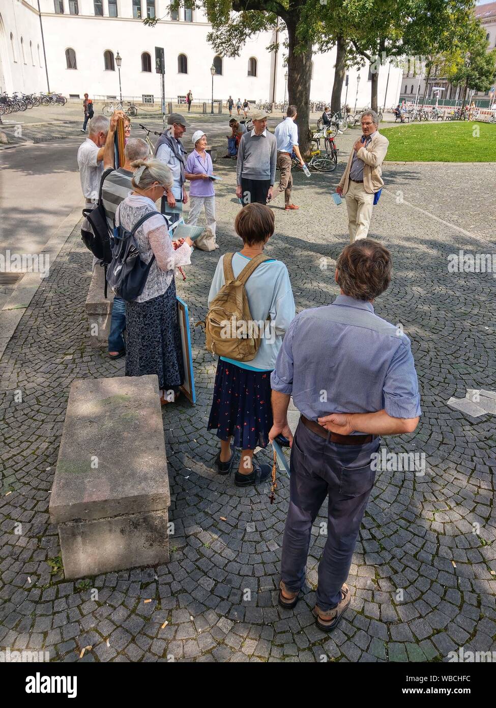 Munich, Bavaria, Germany. 26th Aug, 2019. Headed by well-known anti abortion activist Wolfgang Herring, a small group of Christian anti-abortion activists marched through the city of Munich, protesting against the Pro Familia organization who offers counseling services for pregnant women, ultimately ending at the Ludwig Maximilian University's Geschwister Scholl Platz. Credit: Sachelle Babbar/ZUMA Wire/Alamy Live News Stock Photo