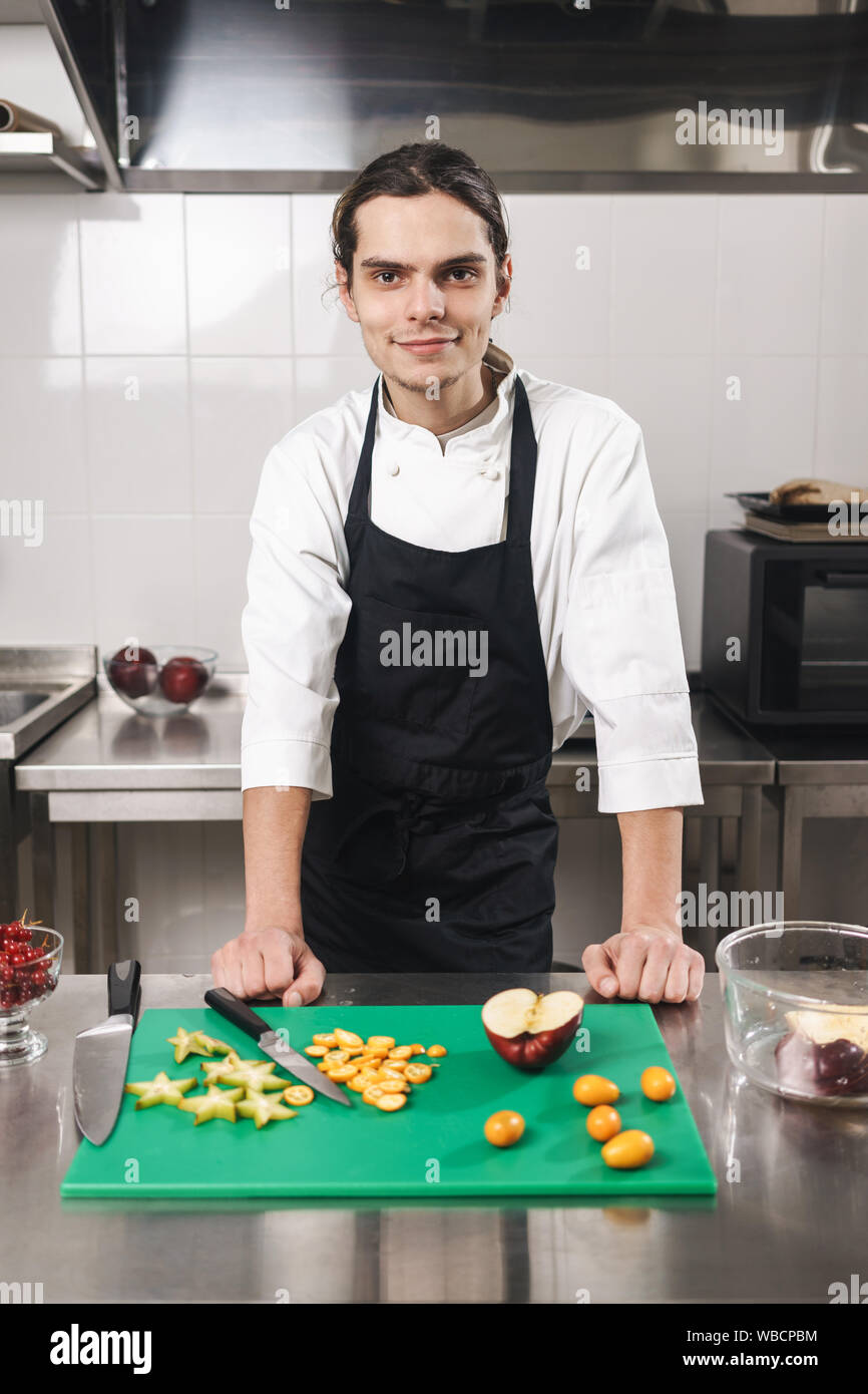 European Cook Young happy european cook hi-res stock photography and images - Alamy