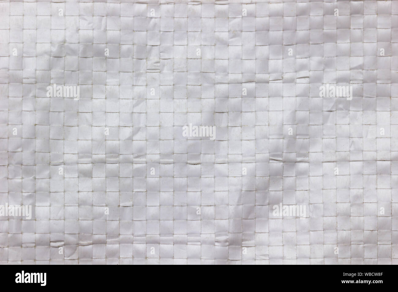 Texture and Wrinkles of white plastic net bag. Concept of recycle