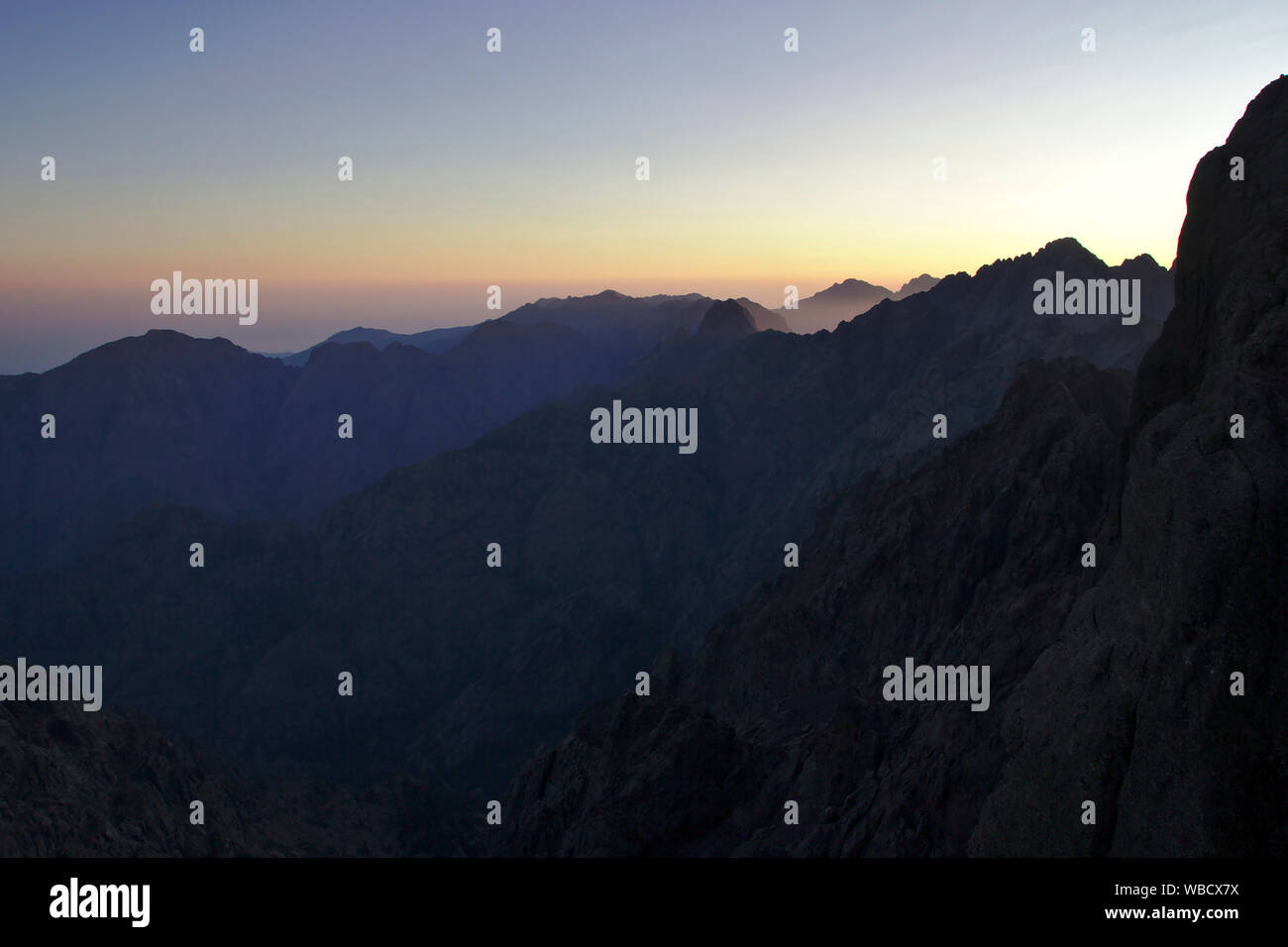 View from Paglia Orba with Cirque de la Solitude, Punta Minuta, moring light, France, Corsica Stock Photo