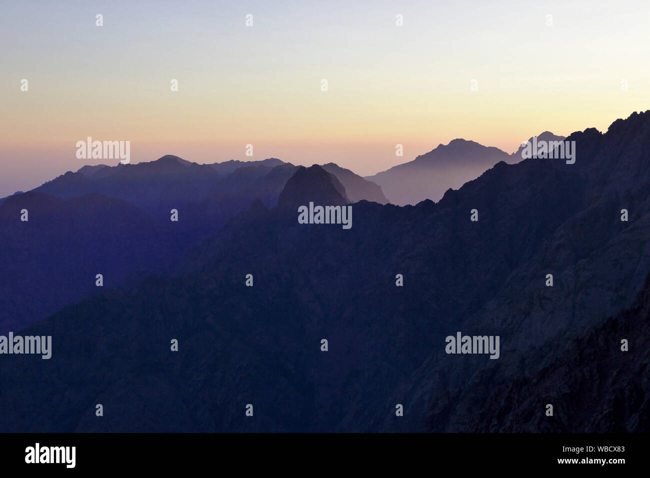 View from Paglia Orba with Cirque de la Solitude, Punta Minuta, moring light, France, Corsica Stock Photo