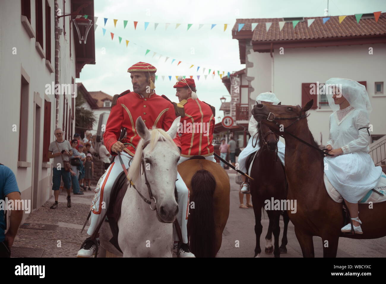 Horse parade through a mountain village, in the Basque country of ...