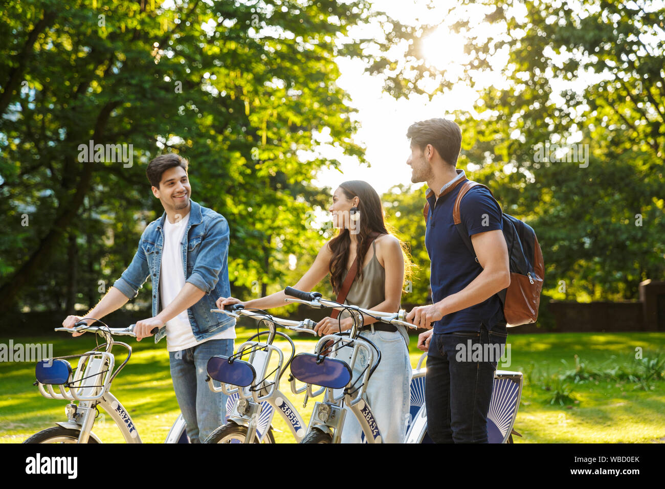 Bike ride together friends cycling woman bicycles hi-res stock ...