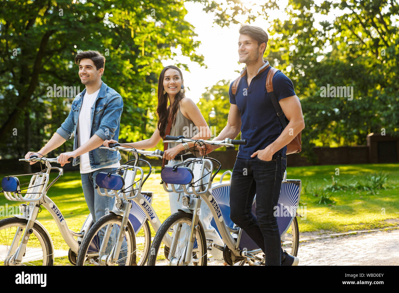 Bike ride together friends cycling woman bicycles hi-res stock ...