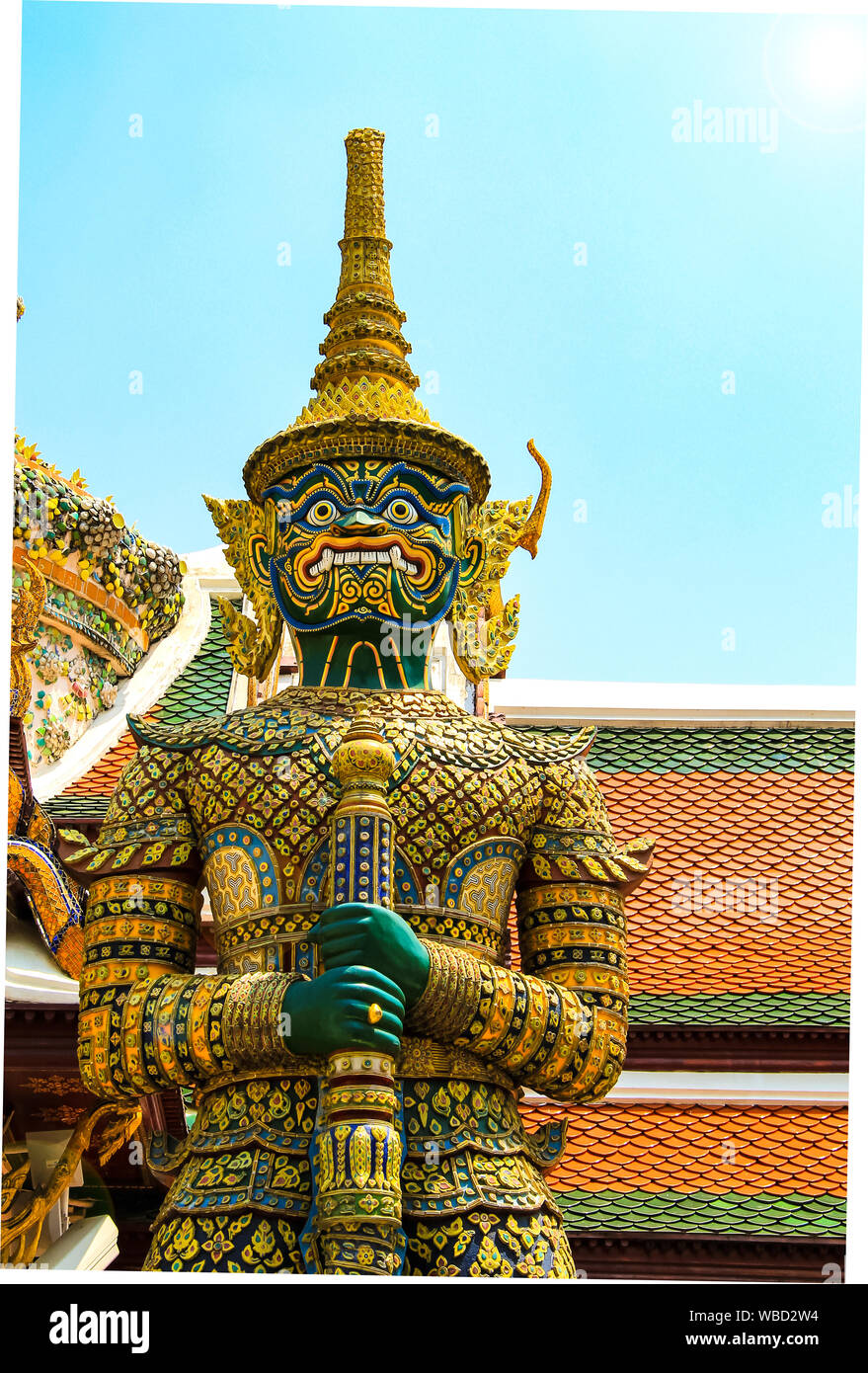 Demon guard at the entrance to the sacred Thai Temple of the Emerald Buddha, in the capital of Thailand Bangkok Stock Photo