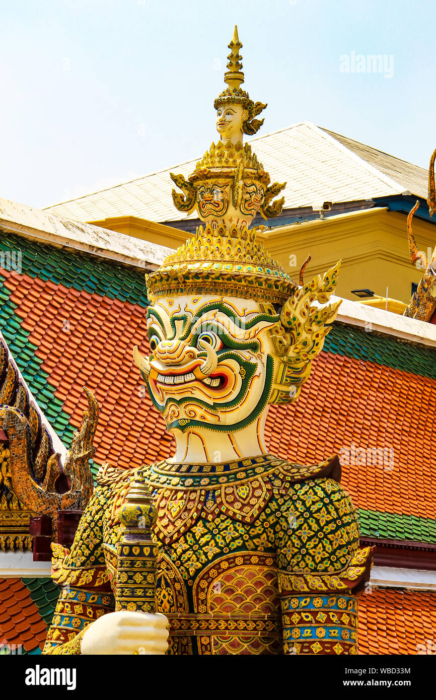 Demon guard at the entrance to the sacred Thai Temple of the Emerald Buddha, in the capital of Thailand Bangkok Stock Photo