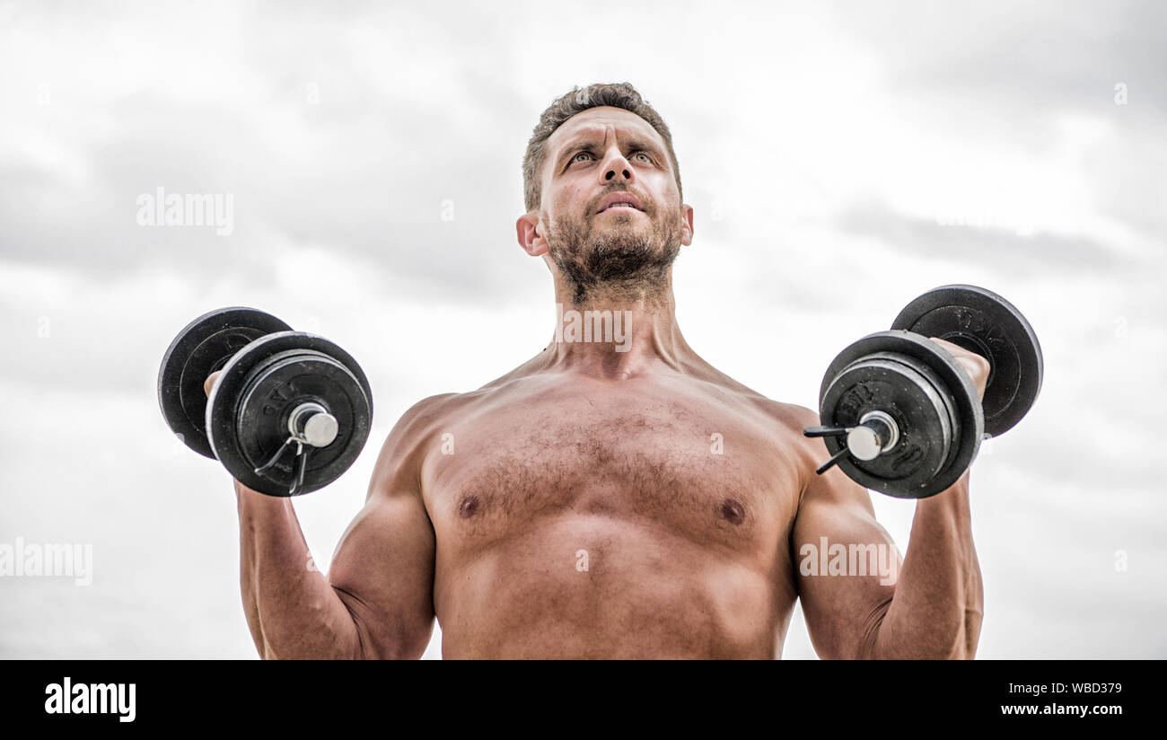 Doing his best. man sportsman strong ab torso. steroids. fitness and equipment. Muscular man exercising with barbell. athletic body. Dumbbell gym. Perfect six pack Stock Photo Alamy