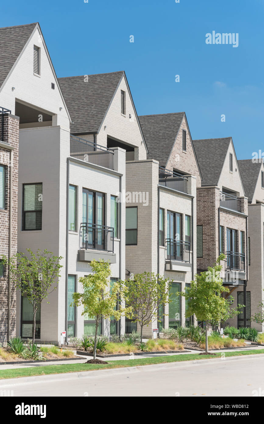 Modern porch of new development three story single family houses near