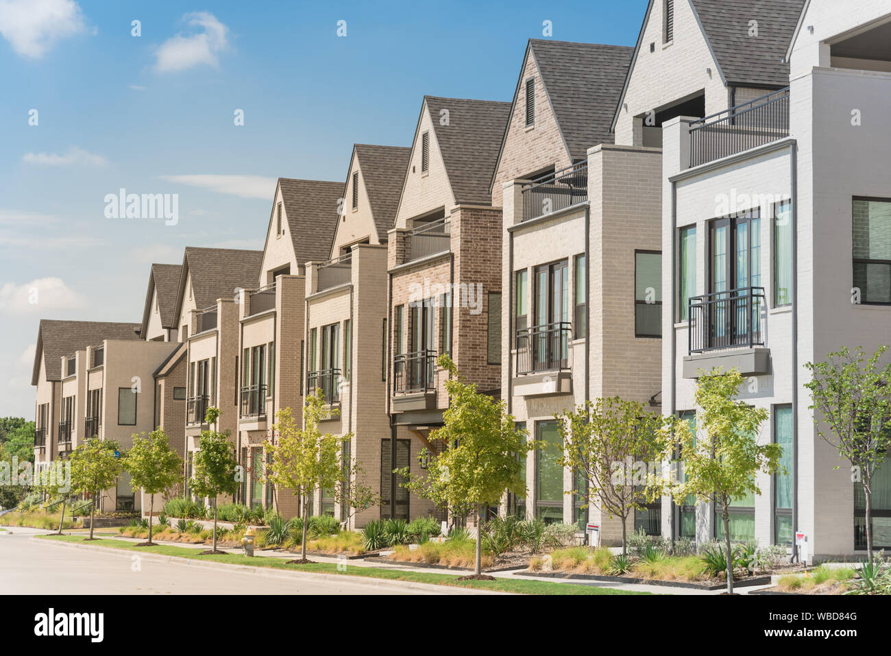 Modern porch of new development three story single family houses near