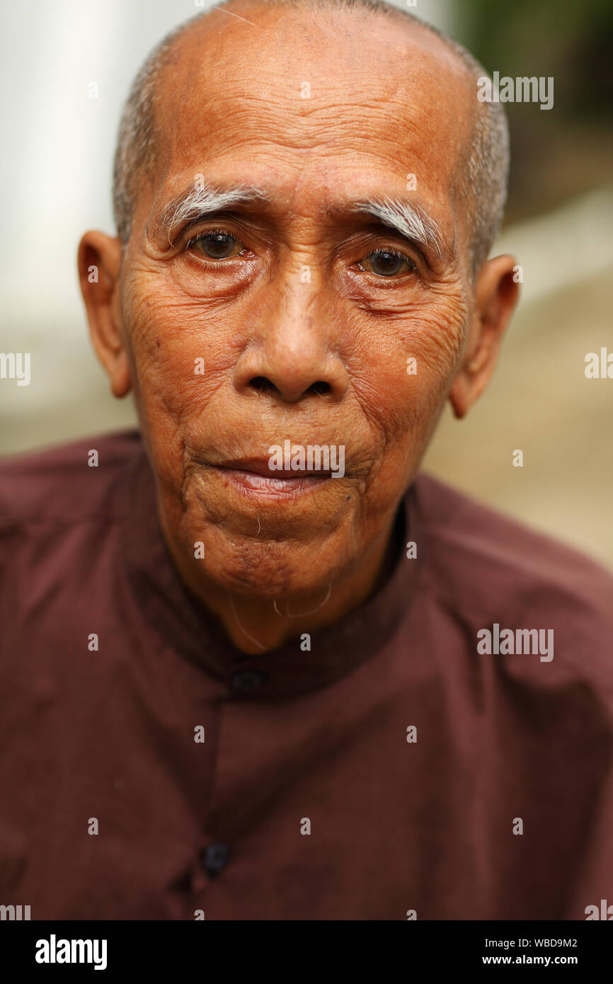 Burmese woman in Mandalay, Myanmar (Burma Stock Photo Alamy
