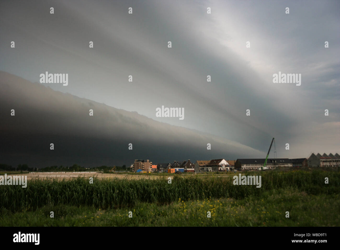 Approaching shelf cloud of a severe thunderstorm over The Netherlands Stock Photo