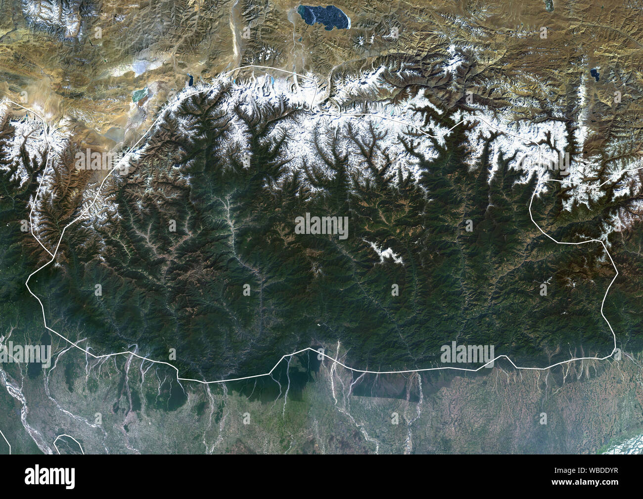Color satellite image of Bhutan (with administrative boundaries) in the Eastern Himalayas. This image was compiled from data acquired by Sentinel-2 & Landsat 8 satellites. Stock Photo