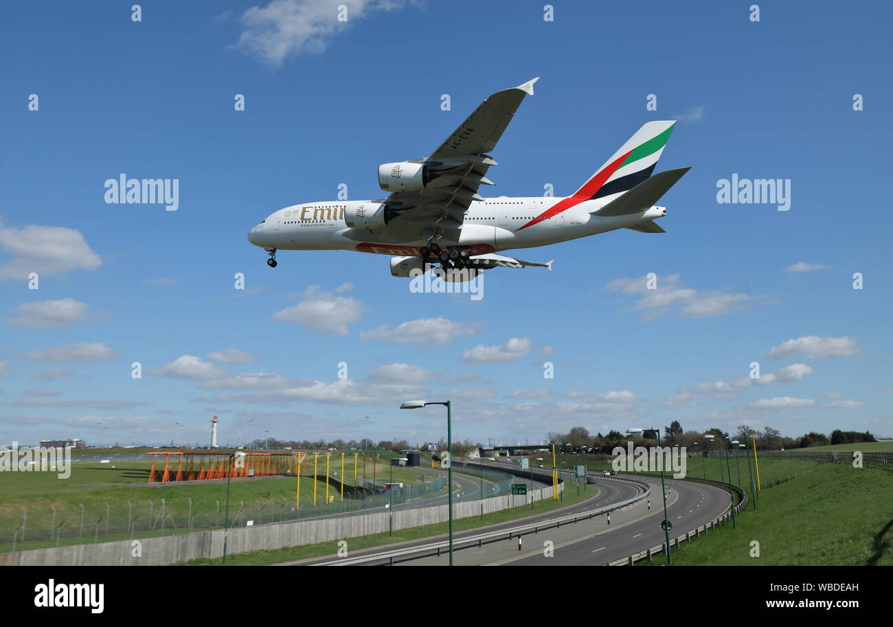 Emirates Airbus A380 passenger airliner, serial number A6-EVA, landing at Birmingham International airport in the UK. Stock Photo
