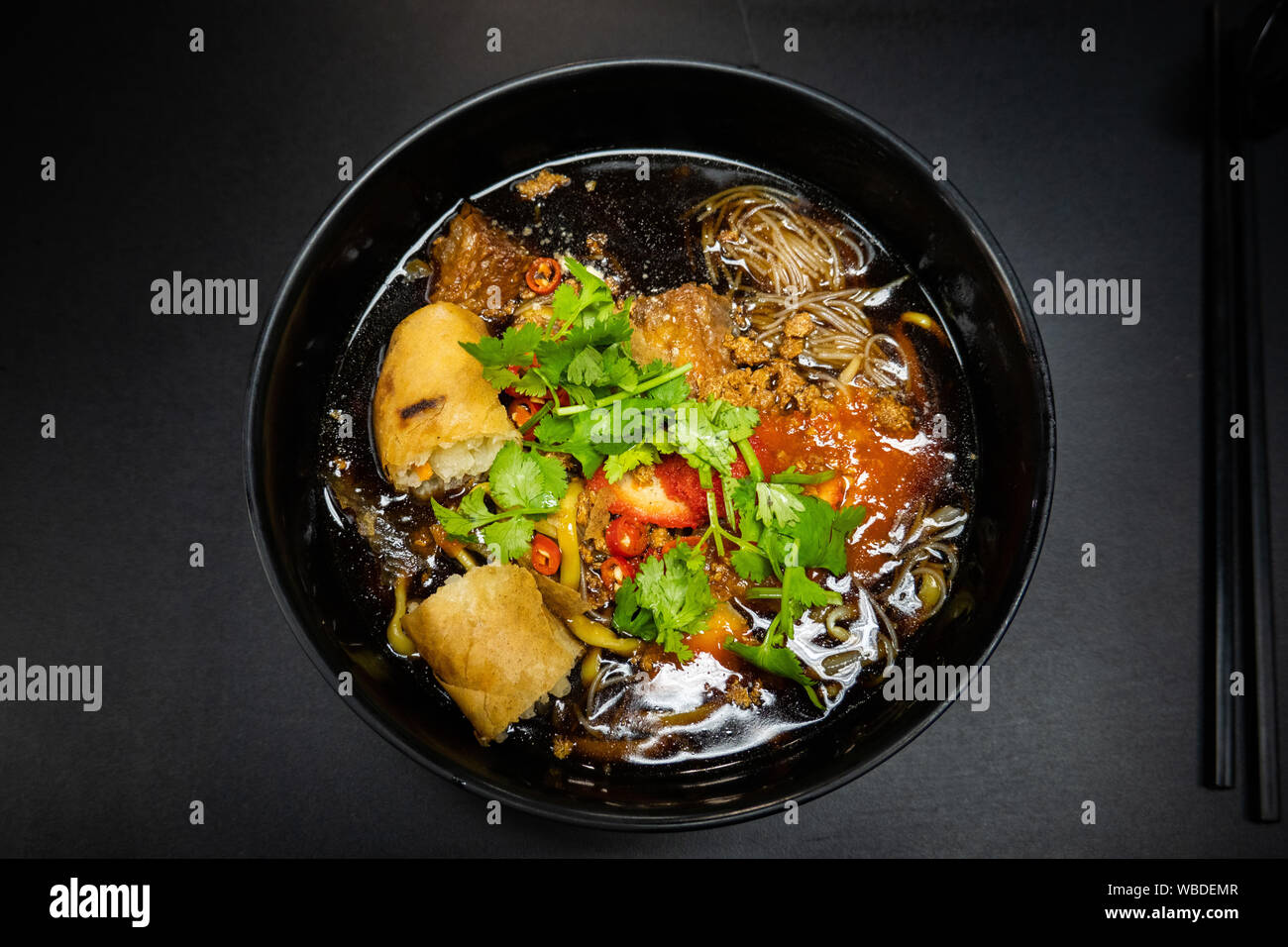 Lor Mee noodles soup - a vegan version of this famous Hokkien dish, served by a hawker stall in Singapore Stock Photo