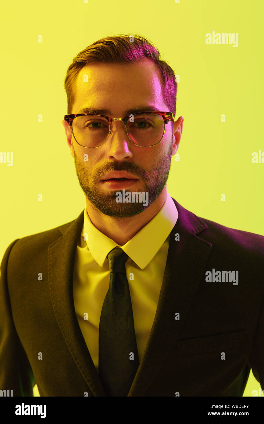 Image Of A Handsome Young Serious Business Man Posing Isolated
