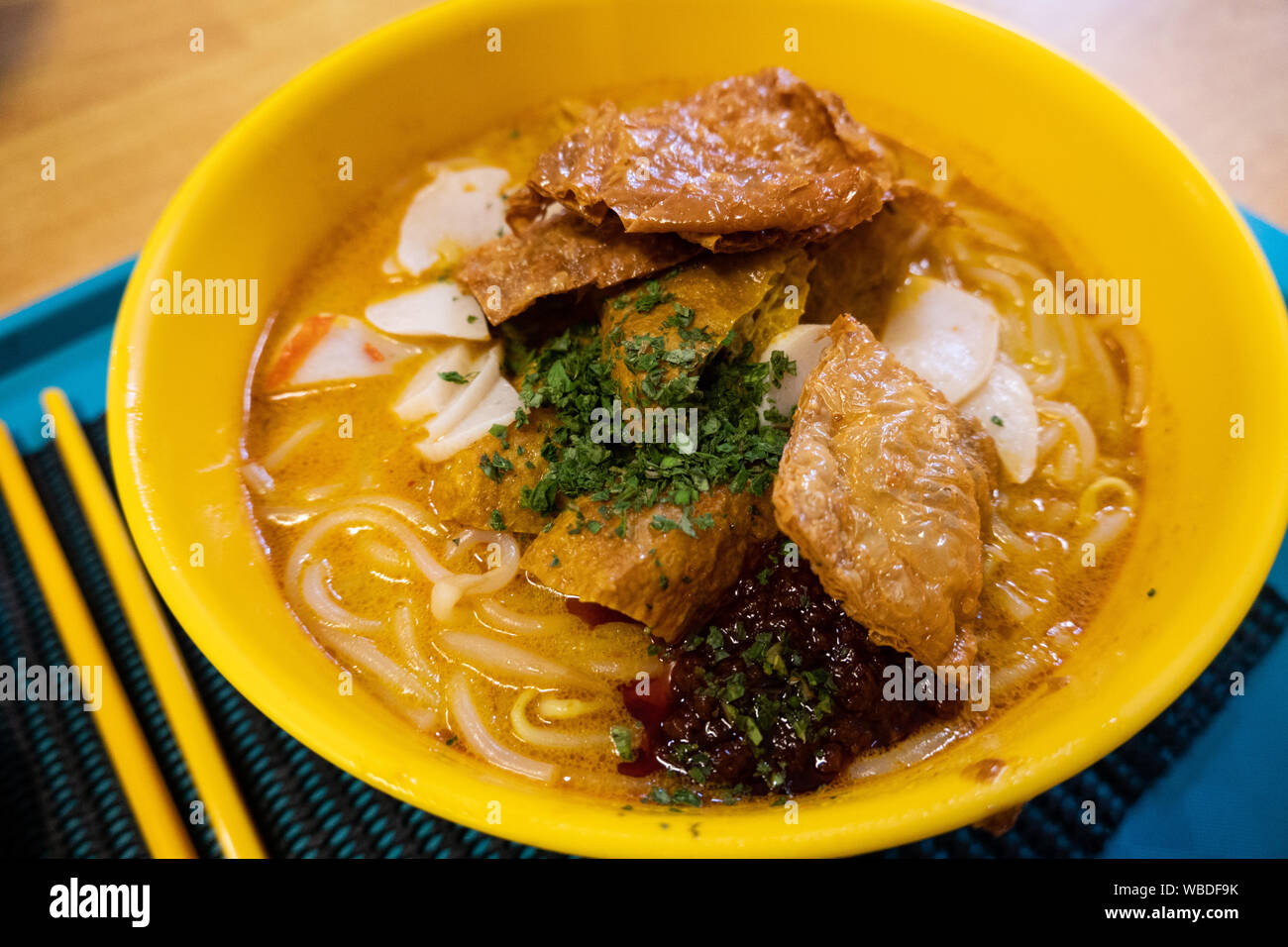 A vegan curry laksa from a hawker stall in Singapore. Noodles, coconut