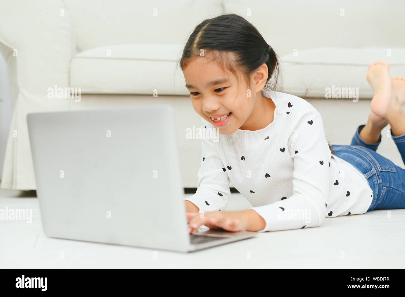 Happy Asian Girl Using Laptop Computer Concept For Kid S Art And