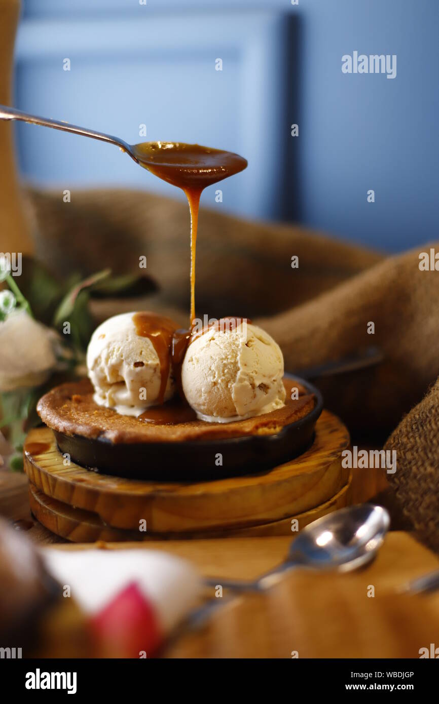 Lotus Cake with Ice cream Topping Stock Photo Alamy
