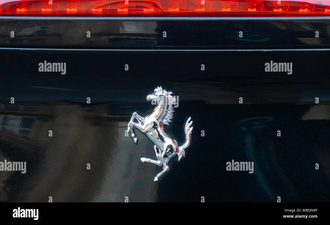 Horse logo on a Ferrari sports car Stock Photo