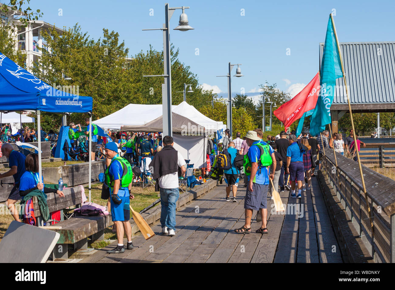 Team tents and canopies along the waterfront at the 2019 Steveston Dragon Boat Festival in Team tents and canopies along the waterfront at the 2019 Steveston Dragon Boat Festival in