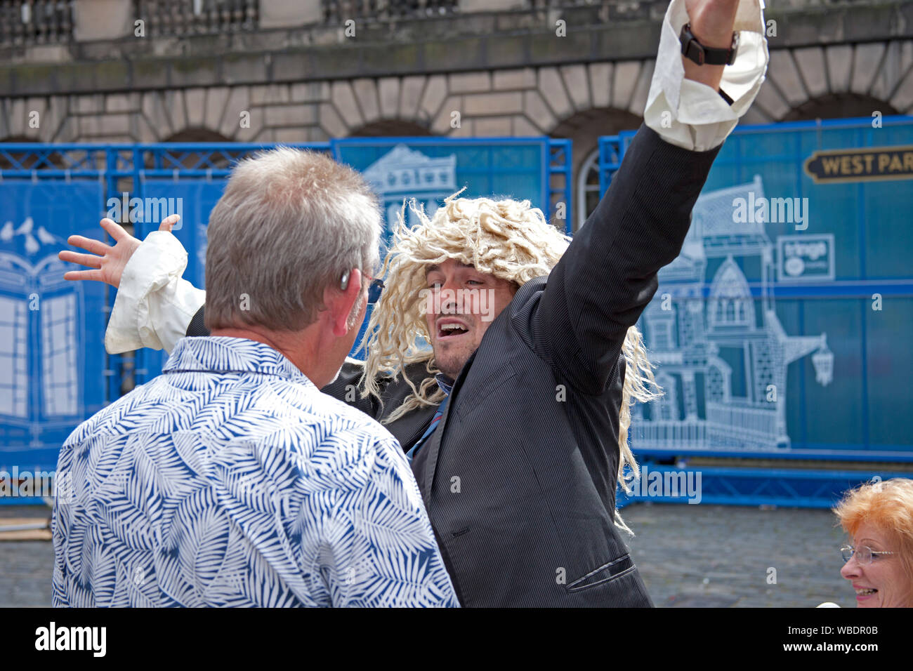 Edinburgh Fringe Festival, Scotland, UK. 26th Aug, 2019. Final day of the 2019 Edinburgh Fringe and the sun shone, with reported record breaking audiences and the most tickets sold ever. Corey Pickett entertains the audience in Parliament Square with his whacky interactive performance Stock Photo