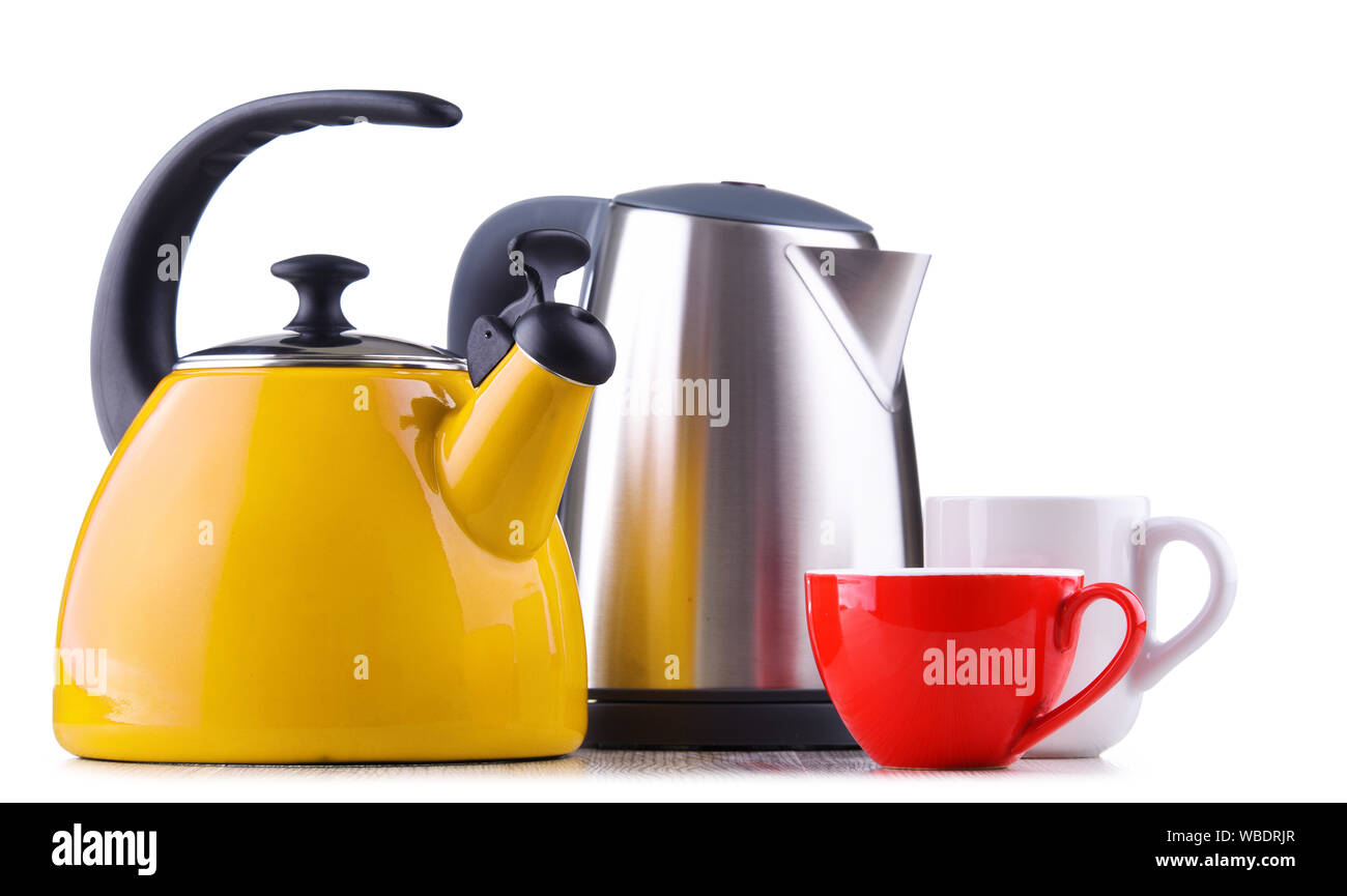 Traditional stovetop kettle with whistle and modern electric cordless kettle isolated on white