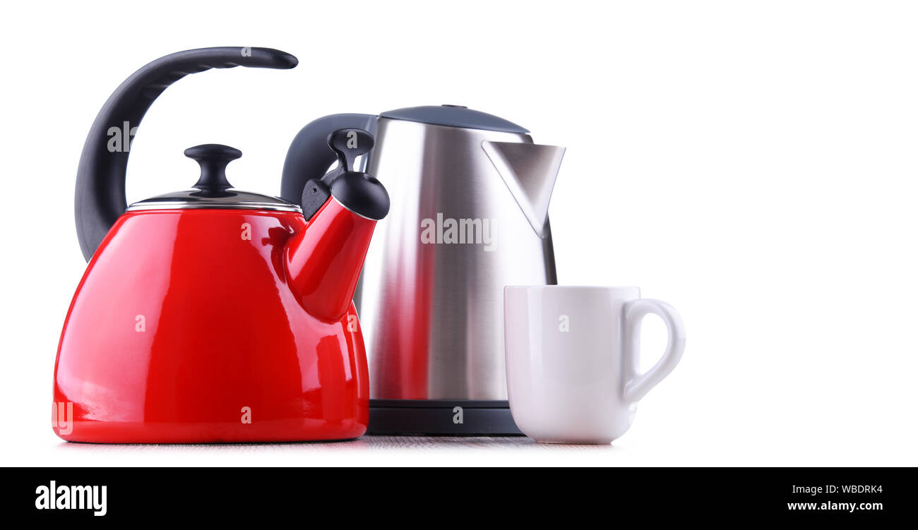 Traditional stovetop kettle with whistle and modern electric cordless kettle isolated on white