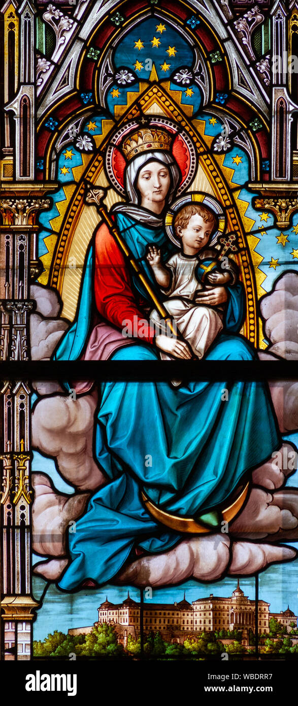 Stained glass window depicting the Virgin Mary with the Infant Jesus and King Saint Stephen I. in the Cathedral of St Elisabeth (Dom Svatej Alzbety). Stock Photo