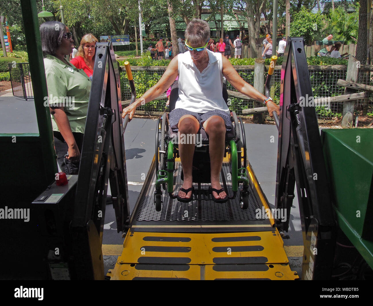 Woman in wheelchair boarding Serengeti Express at Busch Gardens Tampa