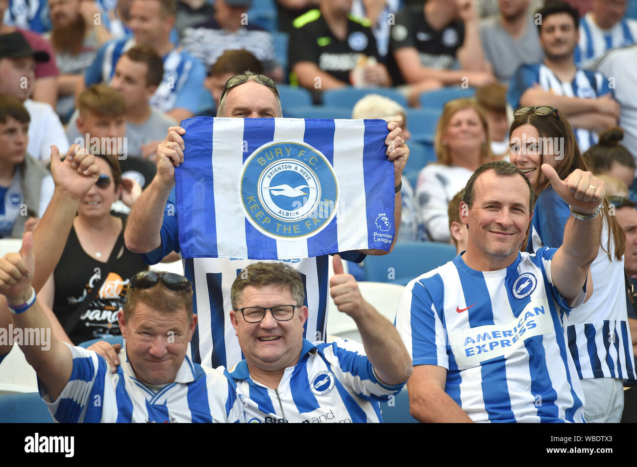 Brighton fans support Bury FC in their fight to remain in the league during the Premier League match between Brighton and Hove Albion and Southampton at the American Express Community Stadium , Brighton , 24 August 2019 Bury are on the verge of going out of the EFL unless a buyer can be found . Editorial use only. No merchandising. For Football images FA and Premier League restrictions apply inc. no internet/mobile usage without FAPL license - for details contact Football Dataco Stock Photo