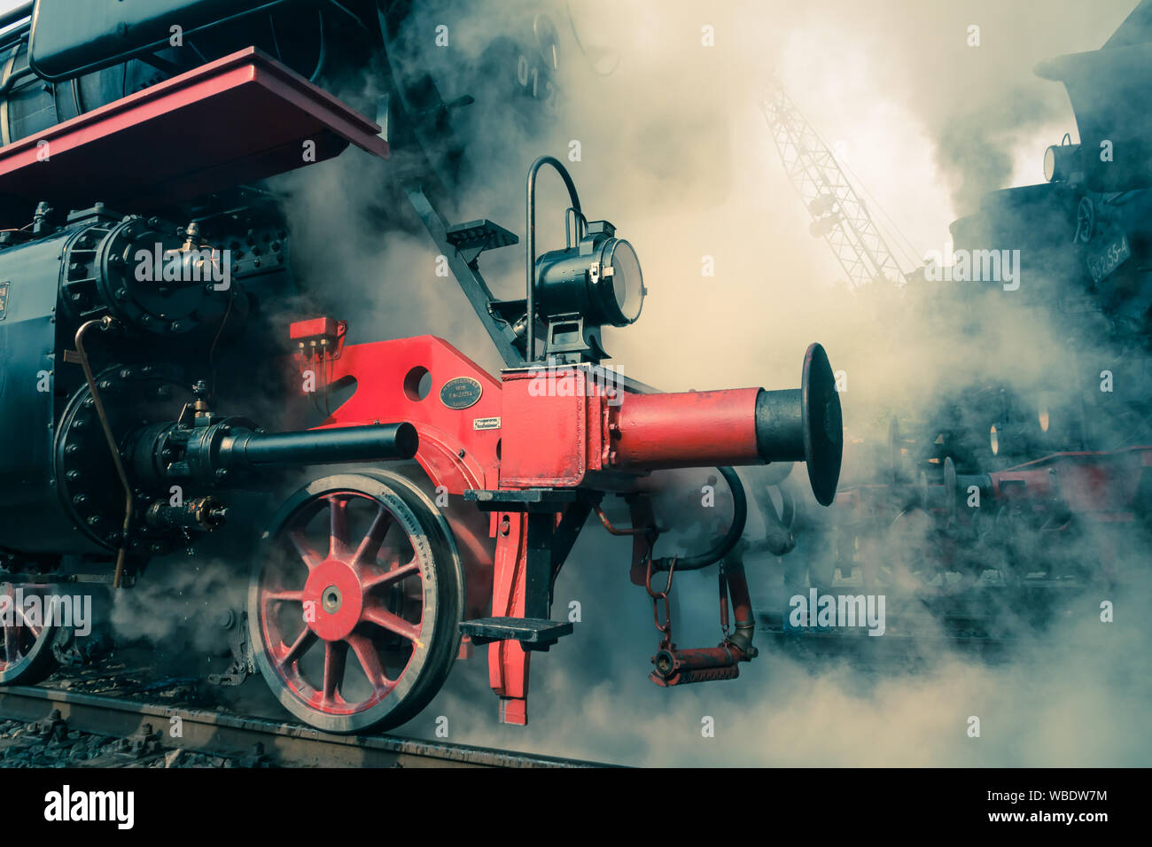 Old steam locomotive in a depot Stock Photo