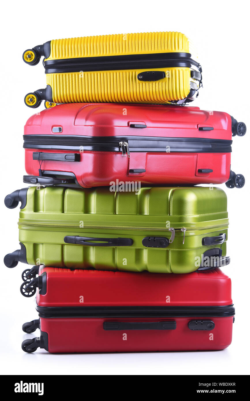 Travel suitcases isolated on white background. Stock Photo