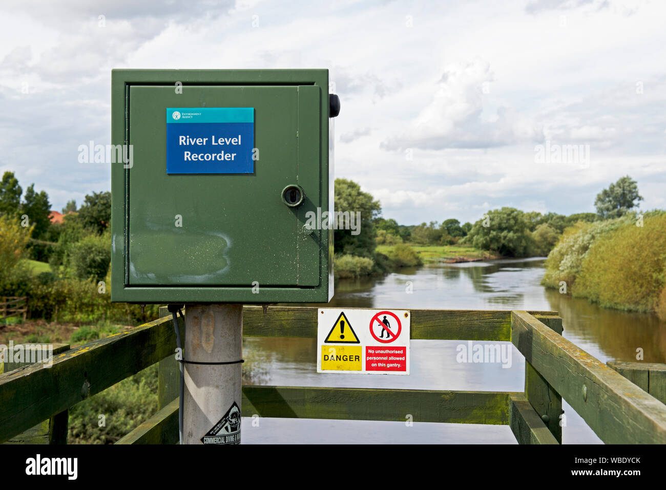 River level recorder mounted on the swing bridge spanning the River Wharfe, North Yorkshire, England UK Stock Photo