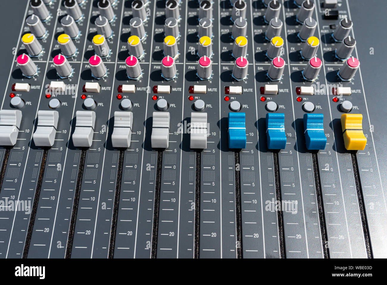 Close up photo of a professional sound mixer with many adjustments, knob  switches and buttons of audio mixer control panel Stock Photo - Alamy