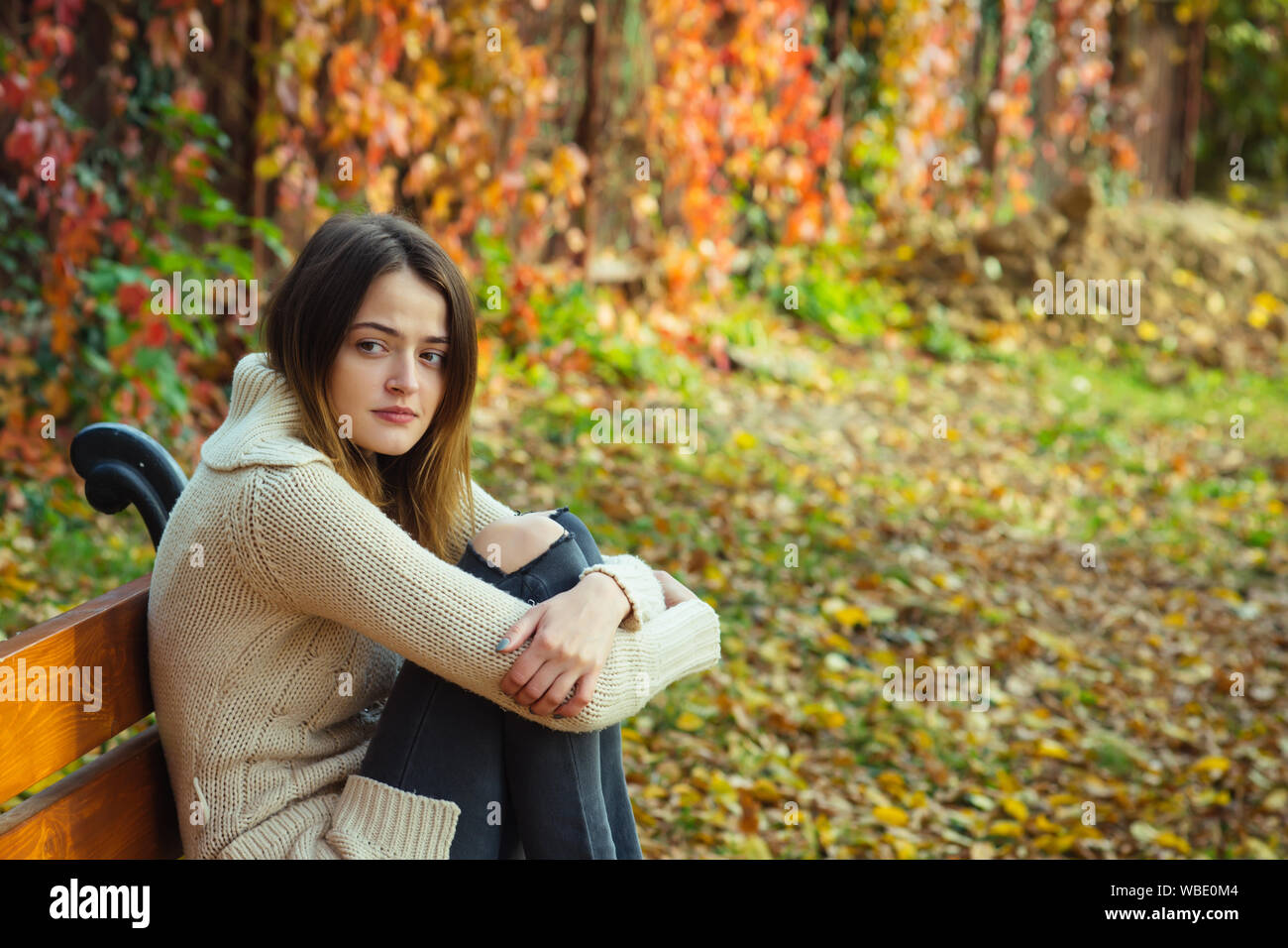 Woman park sad outdoor thoughtful hi-res stock photography and images ...