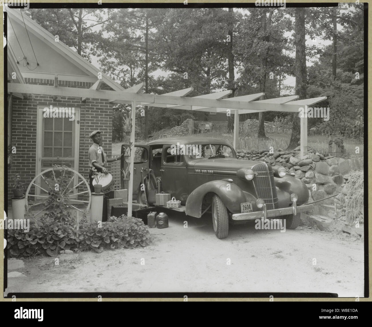 Frances B. Johnston's car and Huntley [Ruff] at the Wheel Inn, Morganton, N.C. Abstract/medium: 1 photographic print : gelatin silver ; 20.2 x 25 cm (sheet), 24.2 x 29.2 cm (mount) Stock Photo