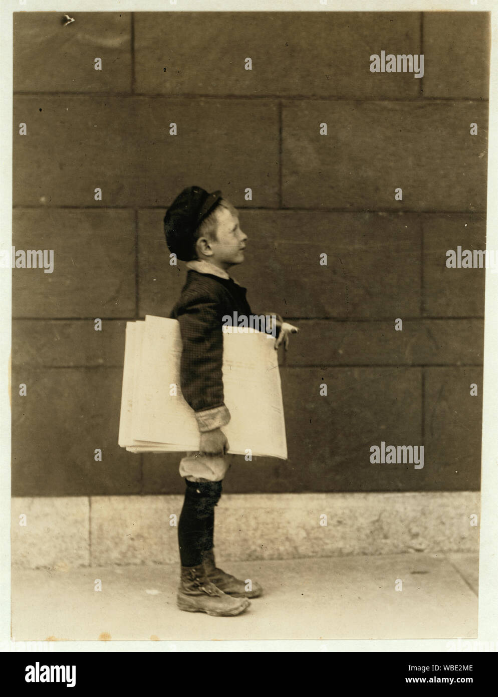Francis Lance, 5 years old, 41 inches high. Sells regularly on Grand Avenue. Abstract: Photographs from the records of the National Child Labor Committee (U.S.) Stock Photo